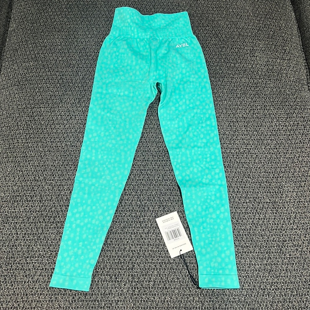COPY - ABYL Evolve speckle seamless legging aqua green in a size XXS